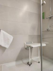 Kúpeľňa v ubytovaní Hotel Jardines de Uleta Suites