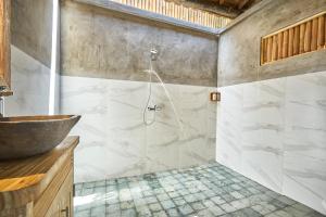 Koupelna v ubytování Arungan Villas