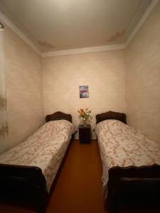 Letto o letti in una camera di Guest House Shateau
