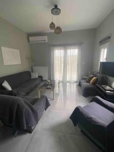 Didima apartment tesisinde bir oturma alanı