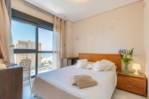 Postel nebo postele na pokoji v ubytování Apartamento Paraíso Florida + 17 fotografií