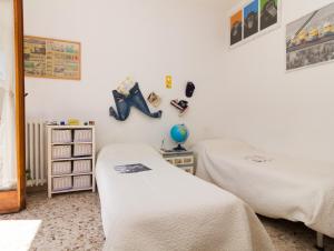 Postel nebo postele na pokoji v ubytování B&B La Capresina