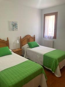 Postel nebo postele na pokoji v ubytování El Estudio de Buenavista