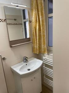 Kylpyhuone majoituspaikassa Haus Roland Wohnung 16