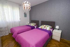 Posteľ alebo postele v izbe v ubytovaní Split Luxury Apartments Rodin