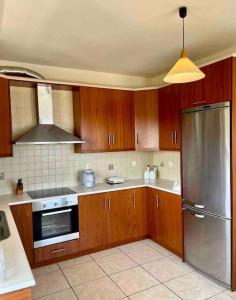 Kuchyň nebo kuchyňský kout v ubytování Sea View Apartment #2