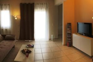 TV a/nebo společenská místnost v ubytování Sea View Apartment #2
