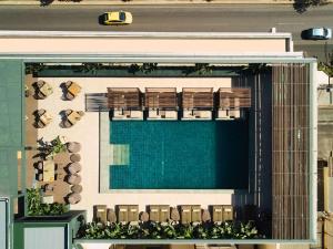 an overhead view of a swimming pool and chairs at Radisson Blu Park Hotel Athens in Athens