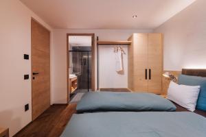 Krevet ili kreveti u jedinici u objektu Max Green Wood Apartments