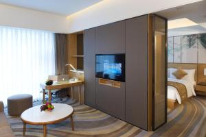 A television and/or entertainment centre at Northern Hotel Shanghai
