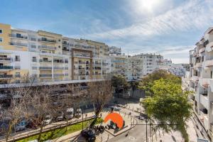 an overhead view of a city with tall buildings at #032 T2 Idalia by Home Holidays in Albufeira