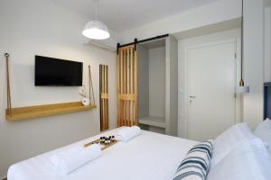 Postel nebo postele na pokoji v ubytování ONAR OURANOUPOLIS