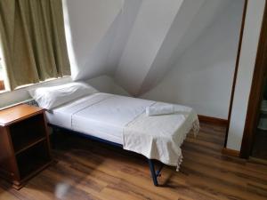 Postel nebo postele na pokoji v ubytování Hello Astur Green