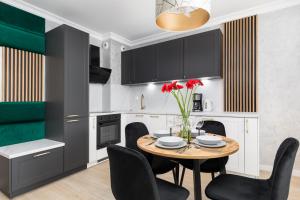 Posedenie v ubytovaní Green Square Apartments Świnoujście by Noclegi Renters