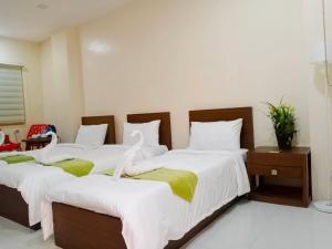 Letto o letti in una camera di RNR Suites