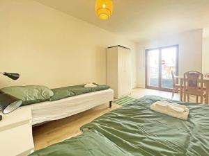 Postelja oz. postelje v sobi nastanitve Nice Apartment in Bernau