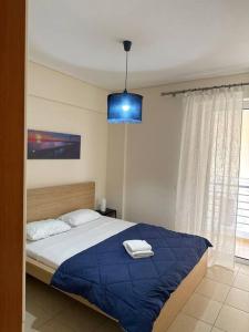 Postel nebo postele na pokoji v ubytování Riviera beach, seaside spacious apt.