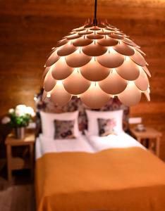 Posteľ alebo postele v izbe v ubytovaní Apartamenty u Harrego BOUTIQUE SPA z klimatyzacja, balkon, sauna, tężnia parking