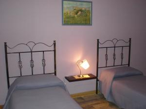 Tempat tidur dalam kamar di Antico Borgo