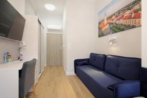 Część wypoczynkowa w obiekcie Dworek Różany Hotel & Restauracja