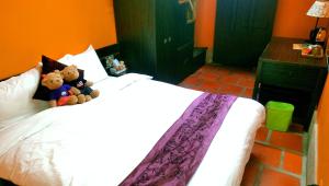 Letto o letti in una camera di PianoPiano B&B