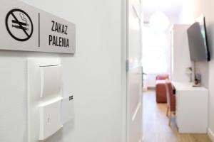 Telewizja i/lub zestaw kina domowego w obiekcie Dworek Różany Hotel & Restauracja