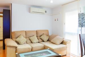 Posezení v ubytování APARTAMENTO AL-ALBA