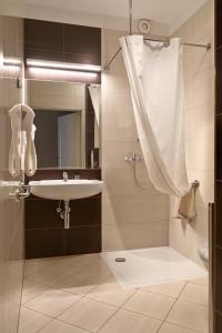 Koupelna v ubytování Hotel Villa Eva
