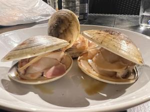 a plate of food with two sandwiches on it at KAI Ichinomiya in Ichinomiya
