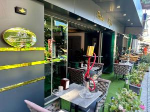 a restaurant with a table in front of a window at Crowned Plus Hotel in Istanbul