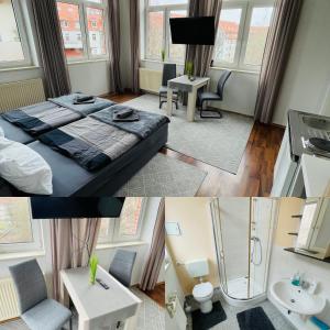 a hotel room with a bed and a bathroom at City Apartments Erfurt in Erfurt