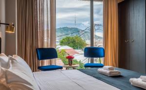 Postel nebo postele na pokoji v ubytování Galavani By Vintage Hotel Collections