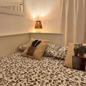 Postel nebo postele na pokoji v ubytování Angoletto Bianco