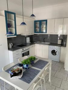 Kuchyňa alebo kuchynka v ubytovaní Blue Maison