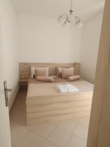 Postel nebo postele na pokoji v ubytování WING 3 apartman ,,BC ,,