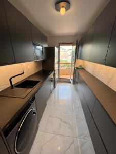 A cozinha ou kitchenette de Beautiful Arty Apartment