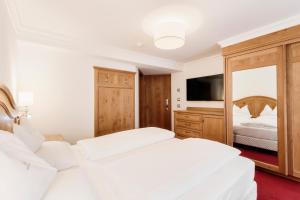 Postel nebo postele na pokoji v ubytování Hotel Ingram