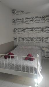 Posteľ alebo postele v izbe v ubytovaní Apartamentos centro histórico