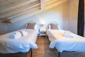 Postel nebo postele na pokoji v ubytování Las Cerezas Gozón