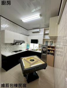 Kuchyň nebo kuchyňský kout v ubytování 維辰包棟民宿Wei Chen Resort B&B