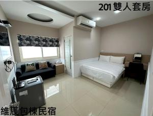 Postel nebo postele na pokoji v ubytování 維辰包棟民宿Wei Chen Resort B&B