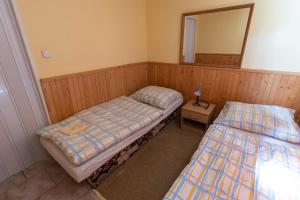 En eller flere senge i et værelse på Drevenice Via Vitis