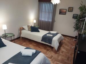 Ένα ή περισσότερα κρεβάτια σε δωμάτιο στο Hospedagem Casa das Regadas +65 φωτογραφίες