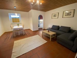 Posezení v ubytování Ferienwohnung Gangsteig + 8 fotografií