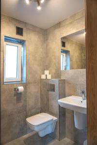 Phòng tắm tại Pokoje Na Wydmie +34 ảnh