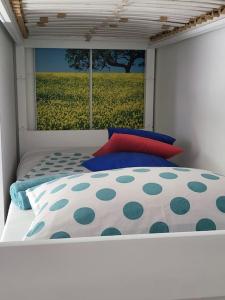 Postel nebo postele na pokoji v ubytování Apartma Sončnica