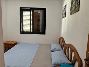 Cama o camas de una habitación en Apartment with Outdoor Pool and Air Conditioning in Cabo Roig