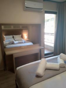 Krevet ili kreveti u jedinici u okviru objekta Golden Sands hotel