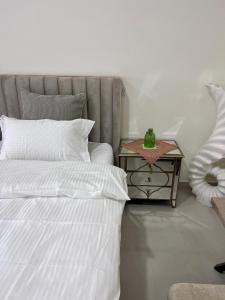 Letto o letti in una camera di Al Artaa Resort