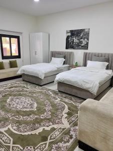Postel nebo postele na pokoji v ubytování Al Artaa Resort + 34 fotografií